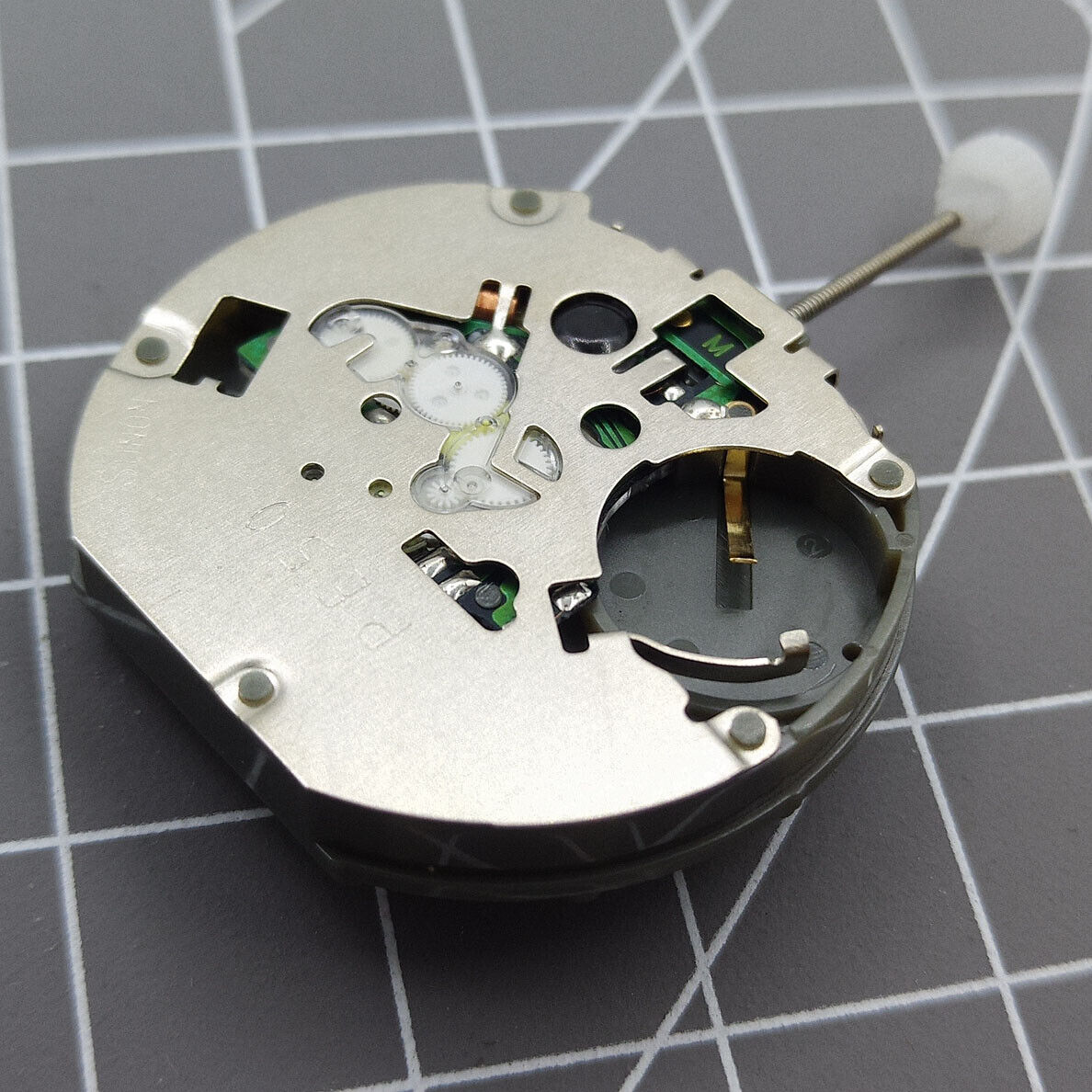 Sunon PE50 quartz watch with 3 hands, date at 3 o'clock, small seconds at 2, 6, and 10 positions.