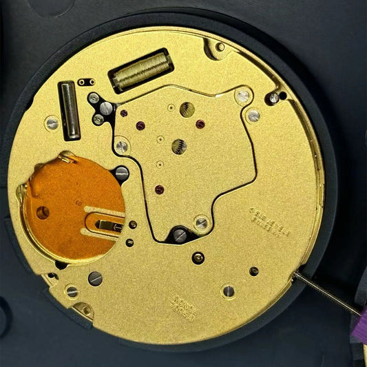 Swiss Made Ronda 7004.B quartz watch movement with small seconds at 6 and big date at 12, precision timekeeping.