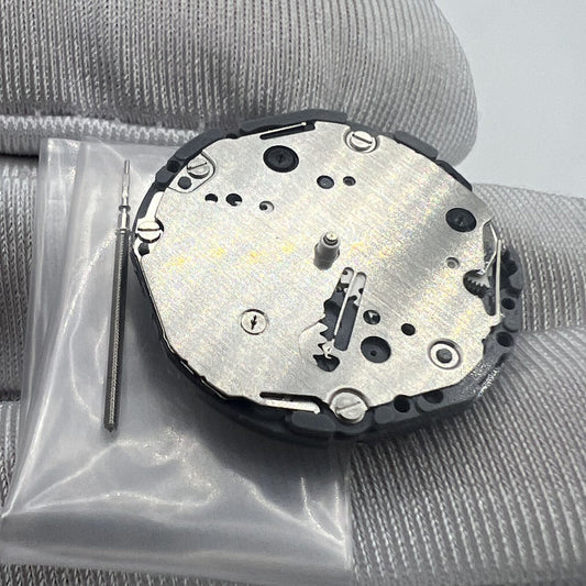Japan Made Hattori Epson TMI VD87 quartz watch movement showing precise internal components and craftsmanship.