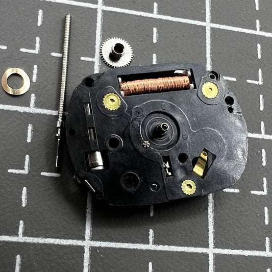 Hattori VX01 Quartz watch movement with 3 hands, precision timekeeping for watch repairs.