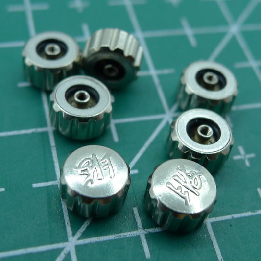 Flat-shaped watch crown with logo, compatible with Shanghai 7120 movement, ideal for repairs and replacements.