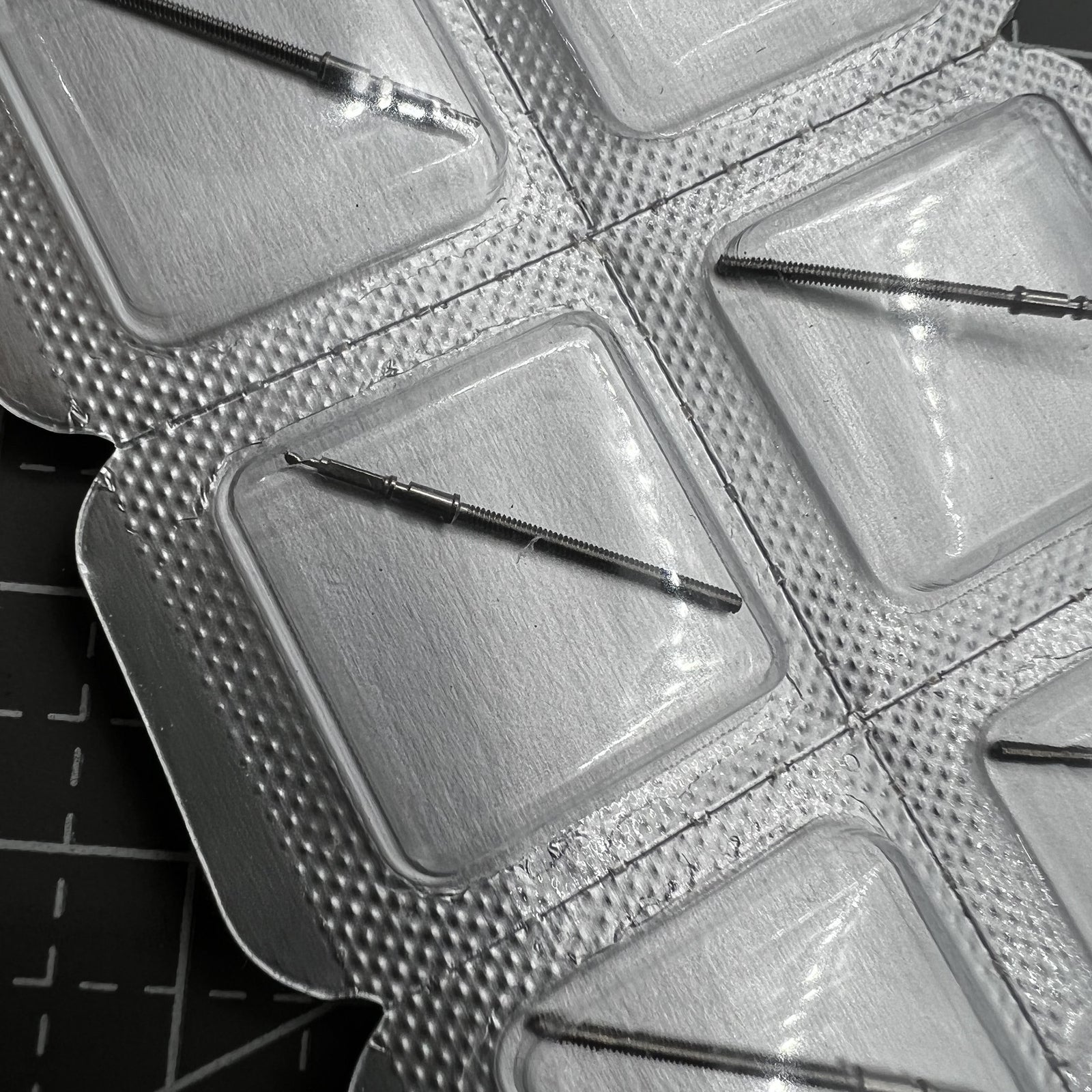 Set of 5 ETA C07.111 winding stems for watch movement repair and replacement. Durable precision parts by ETA.