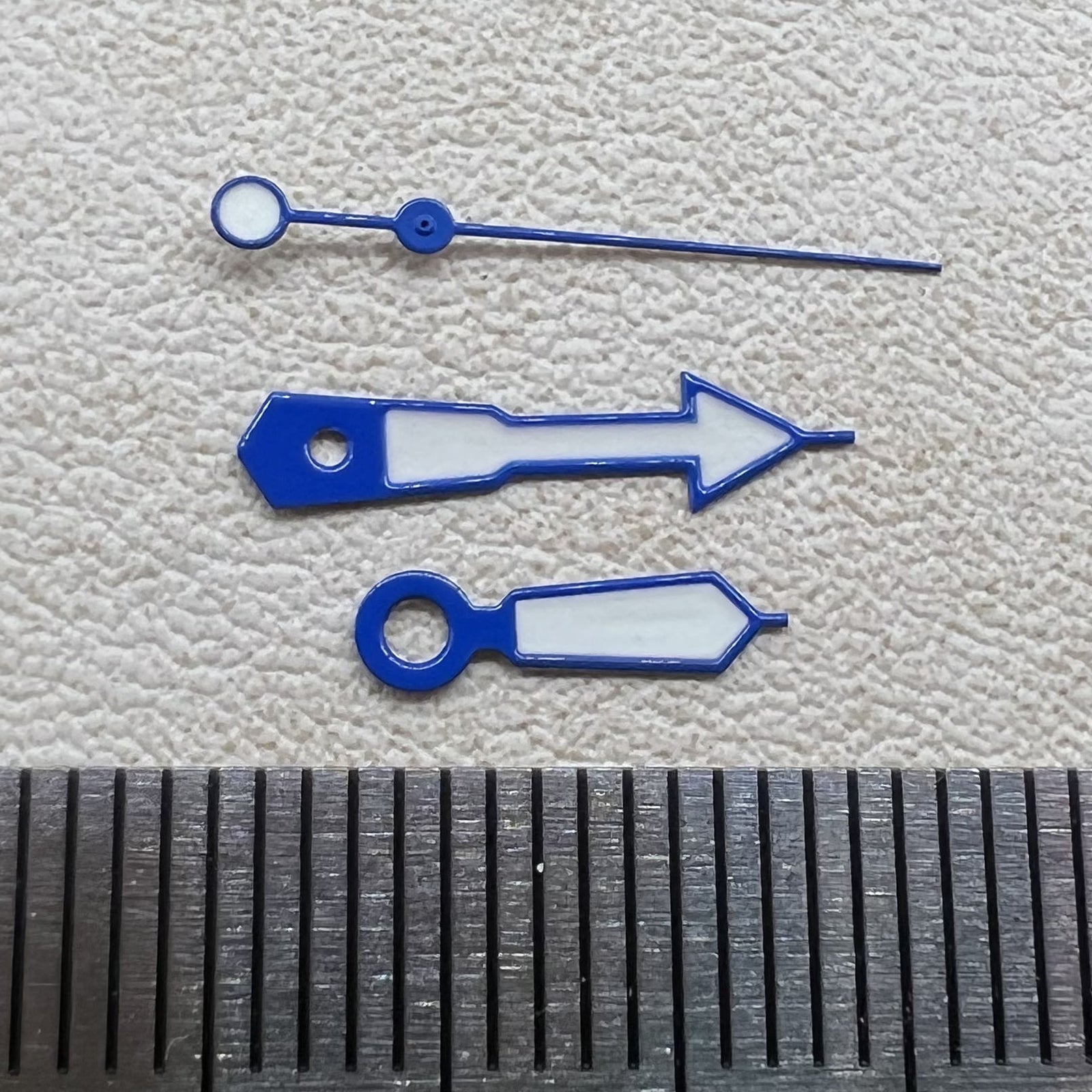 12.5mm blue-trimmed white watch hands with green lume for NH35, NH36, 7S26, 7S36 movements.