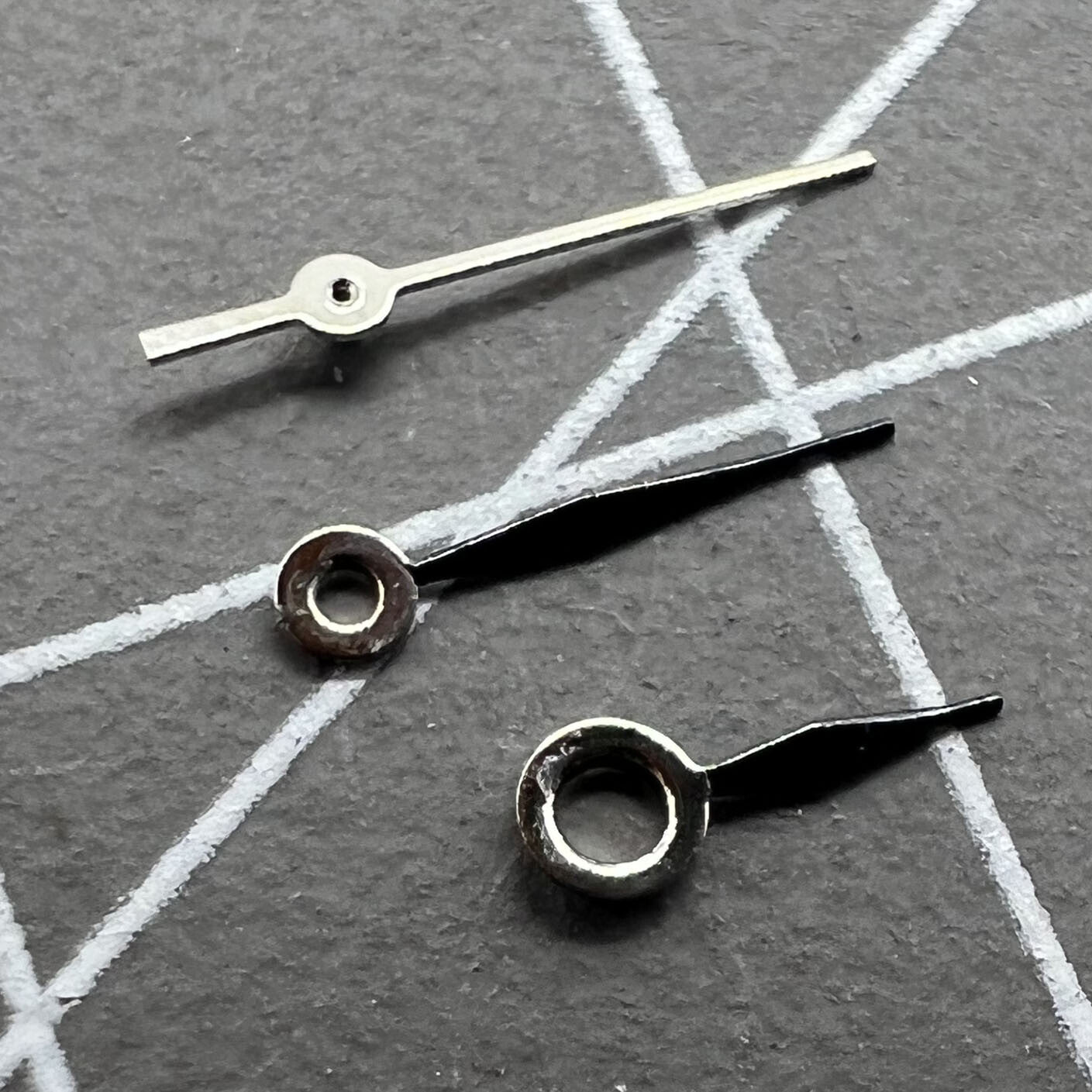 Polished black tip 6.5mm watch hands for Miyota 1L12 quartz, sleek design, no lume.