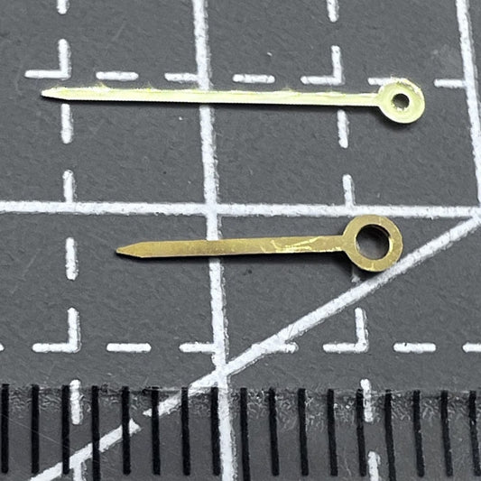 Set of golden watch hands compatible with ETA282.001/002 and ETA E03.001 movements for precise repairs.
