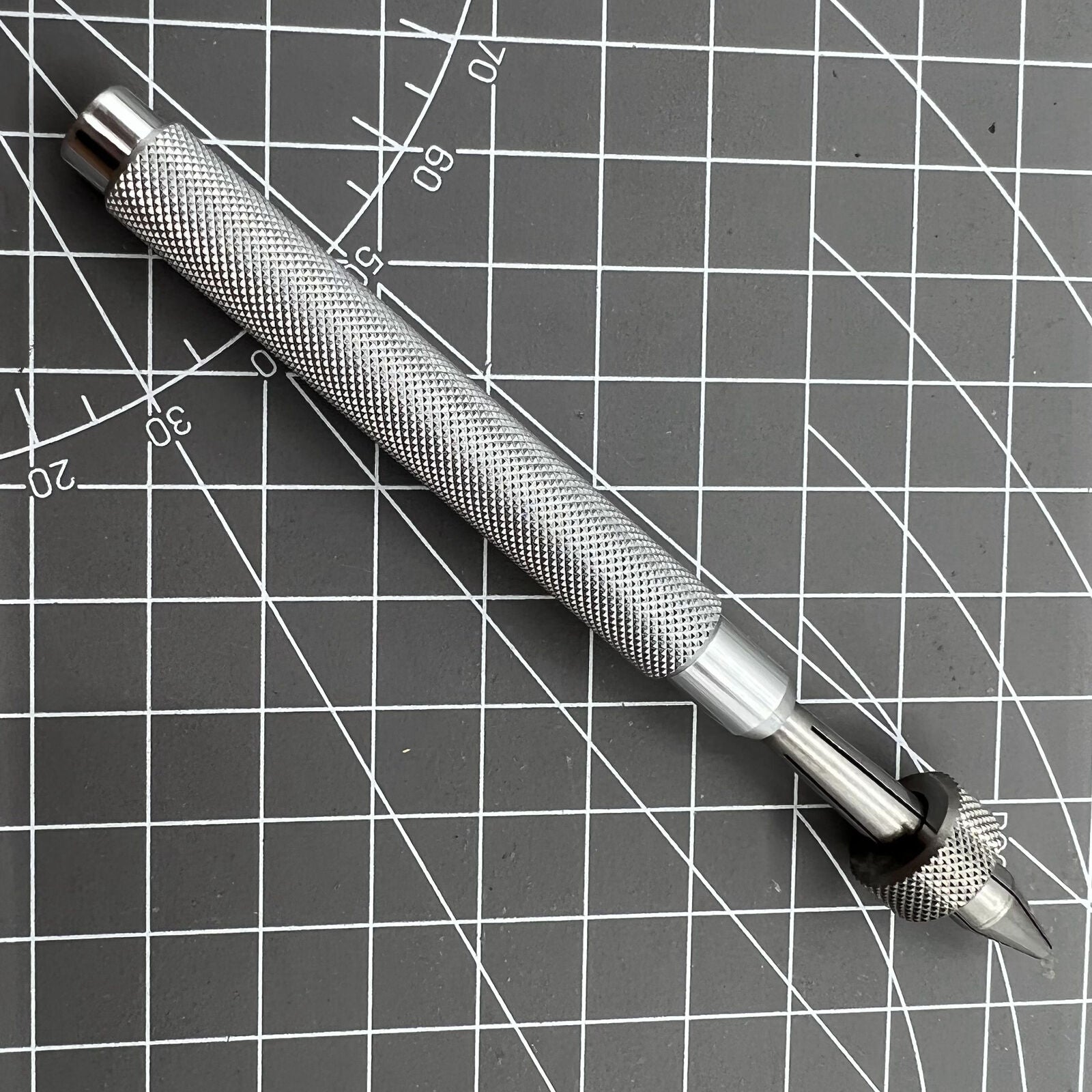 Holder clamp tool pin vice for precise watch crown lever repair.