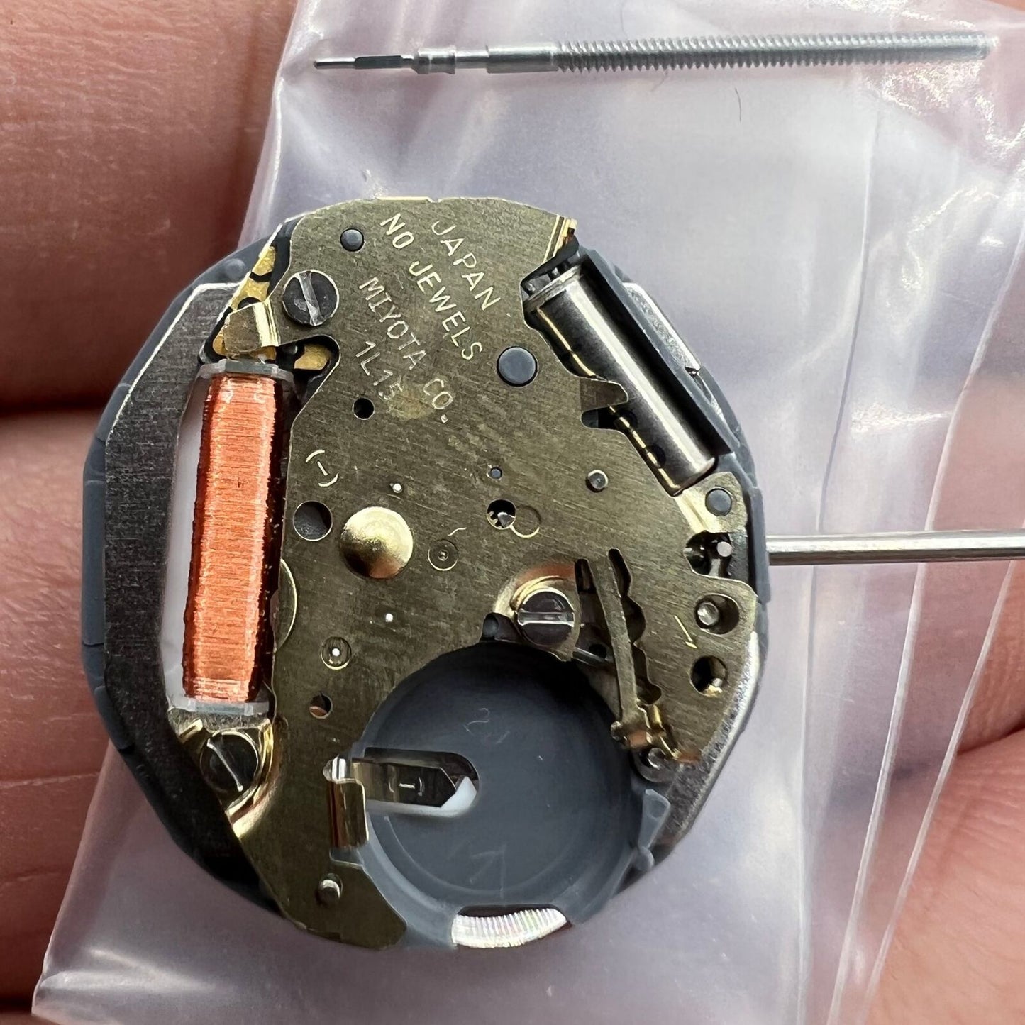 Miyota 1L15 Japan Quartz watch movement with date display at 3 o'clock, precise and durable.