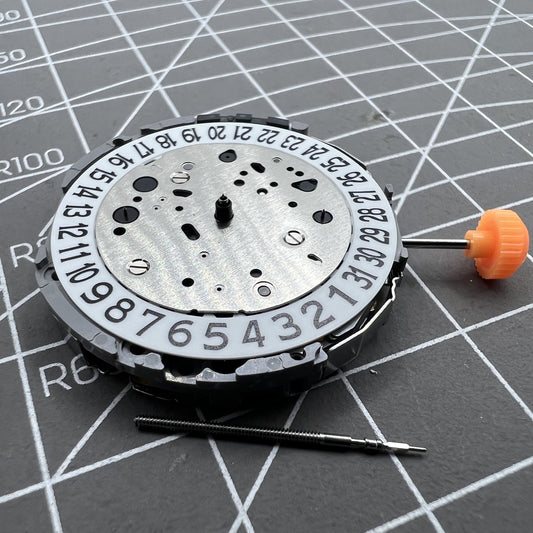 Miyota JP21 quartz movement with date display at 3 o'clock for precise timekeeping.