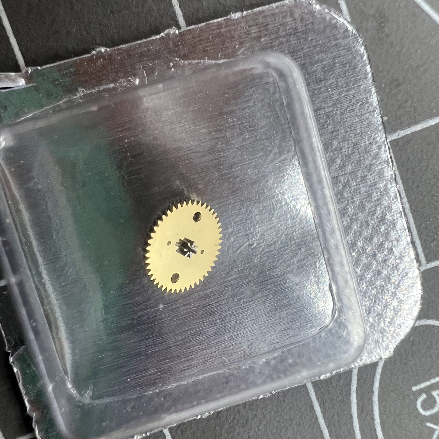 Ratchet wheel for Miyota 8200 movement, Seiko precision part boosting watch accessory durability.