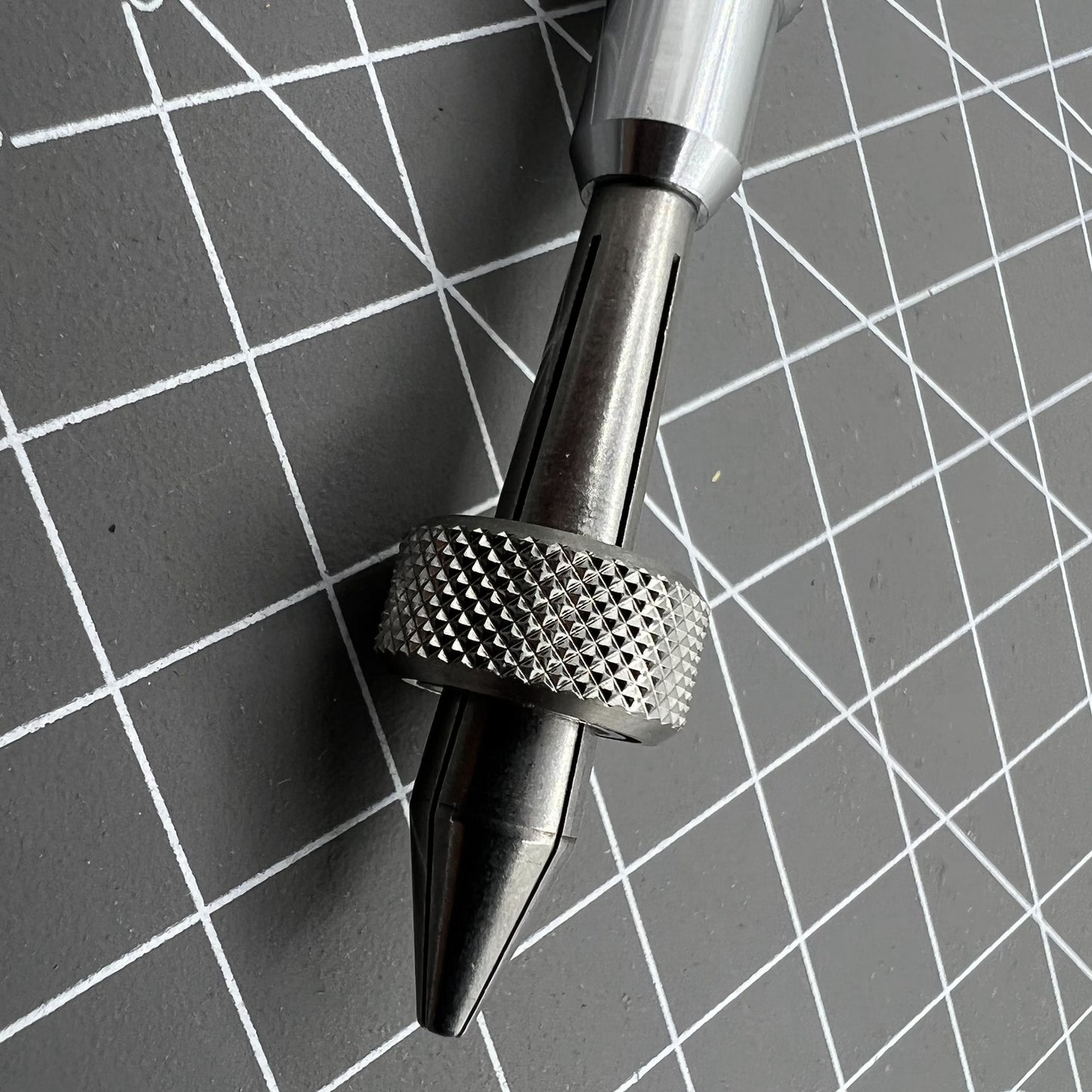 Holder clamp tool pin vice for precise watch crown lever repair and adjustment.