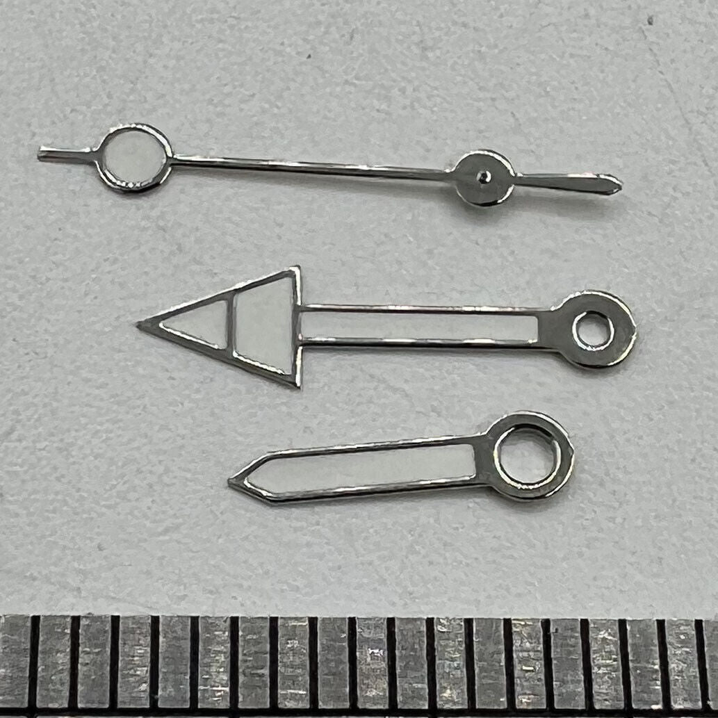Arrow-shaped silver trim green luminous watch hands for NH35 movement, enhancing precision timekeeping with Seiko quality.