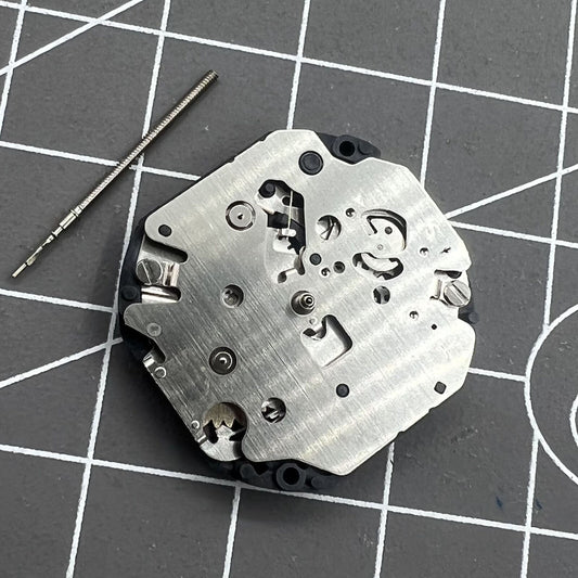 Hattori Epson TMI VX3S quartz watch movement with stem, ideal for precise timekeeping and repairs.