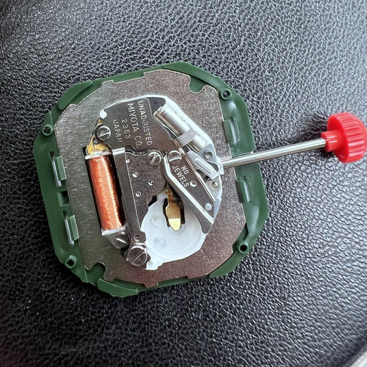 Japan Miyota 2353 quartz watch movement with big date display at 3 o'clock, 3-hand design for precise timekeeping.