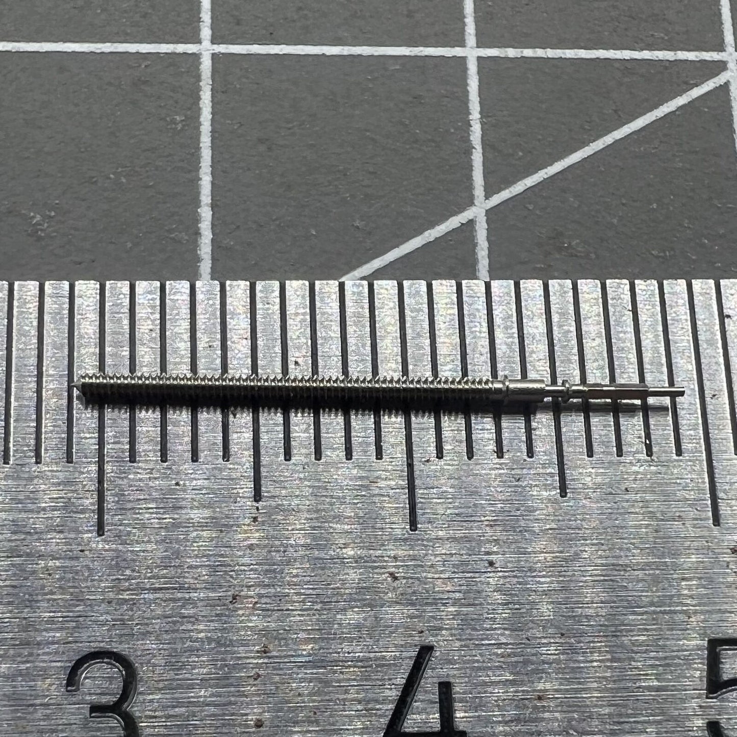 Generic watch winding stem for VK63 movement, compatible with precise time adjustment features.