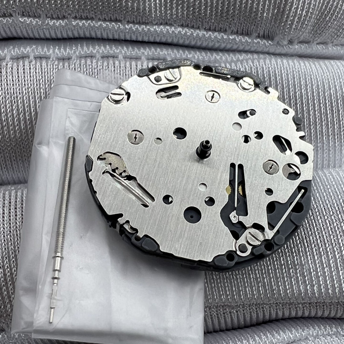 Hattori Epson TMI VH63A quartz watch movement from Japan displaying precise mechanical components.