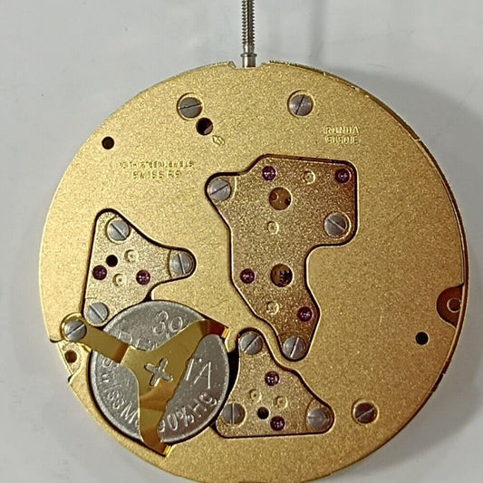 Swiss Made Ronda 5050C watch movement with date at 6, golden gilted finish for watch repair.