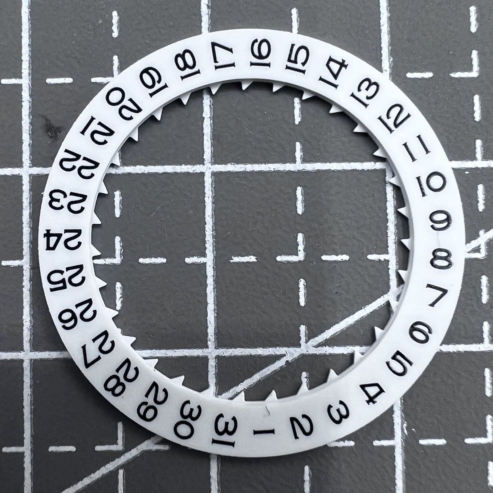 White Date Disk Wheel set for Miyota 8215 watch movement, enhancing date display accuracy.