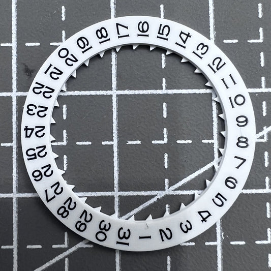 White Date Disk Wheel set for Miyota 8215 watch movement, enhancing date display accuracy.