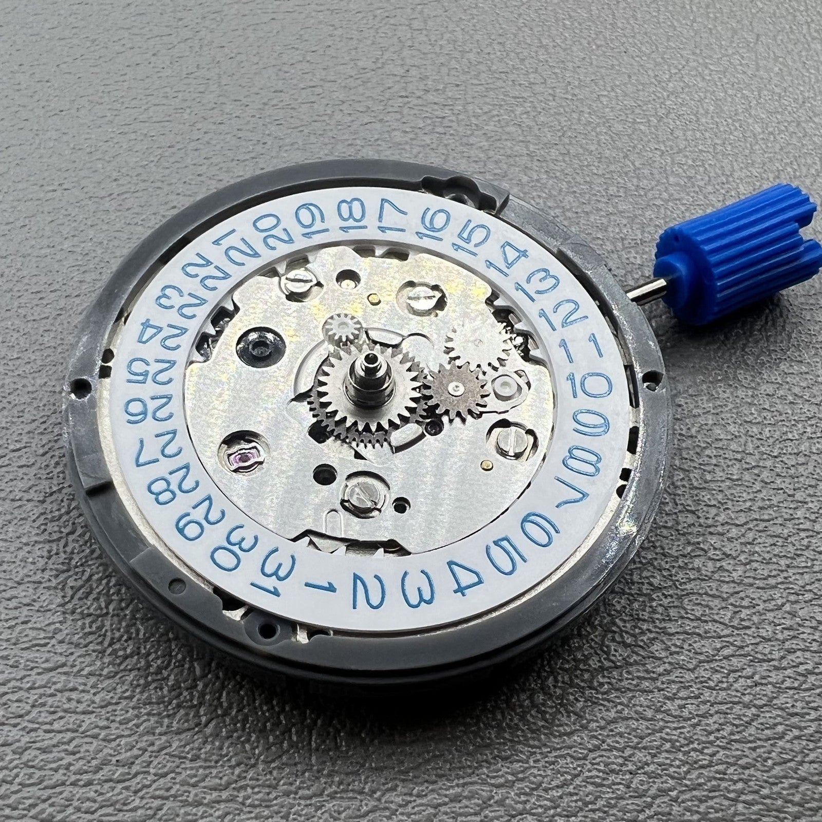 Seiko NH34 automatic GMT watch movement showing precise hacking seconds and smooth operation.