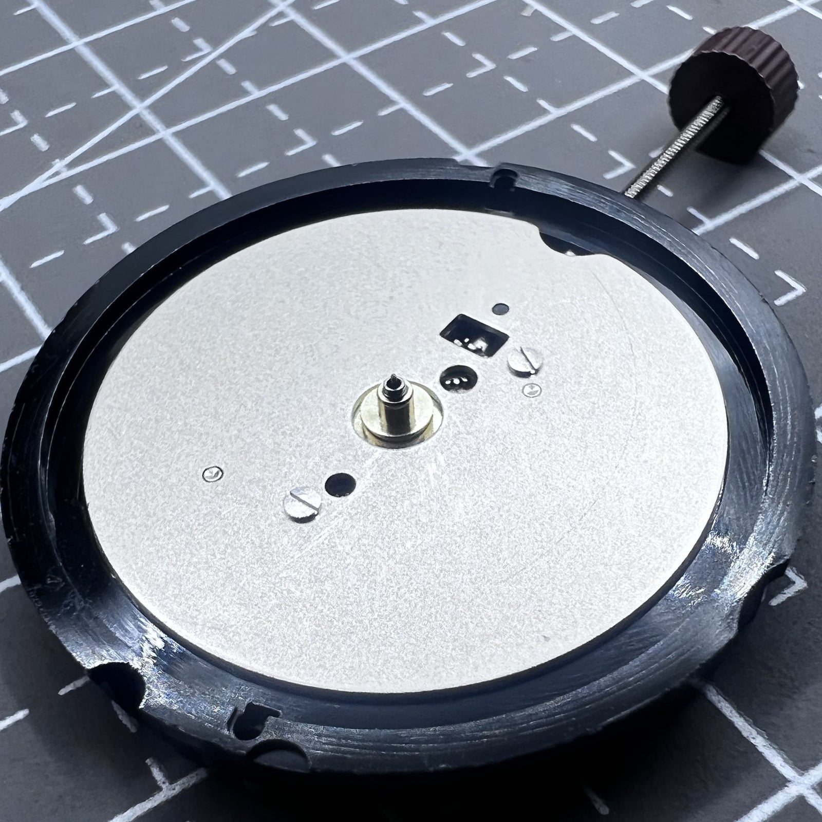 Close-up of Swiss Ronda 513 quartz watch movement showcasing precise timekeeping by Ronda brand.