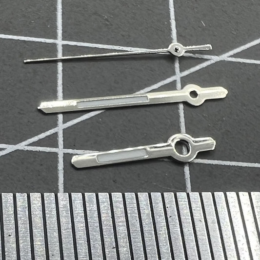 Silver-trimmed 13mm watch hands with green lume for Hattori Epson PC32 quartz movement accessories.
