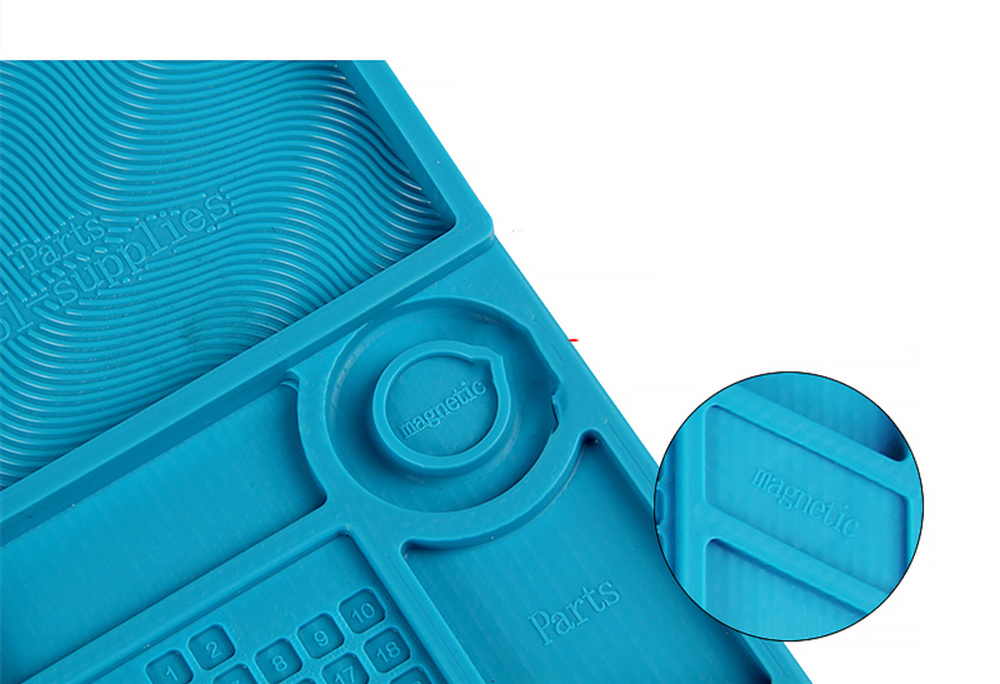 Heat-resistant silicon soldering mat, protects desks during electronics repair and soldering tasks.