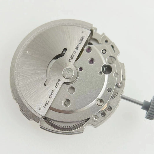 Miyota/Citizen 8215 automatic watch movement with black dial and date at 6, Japan-made precision.