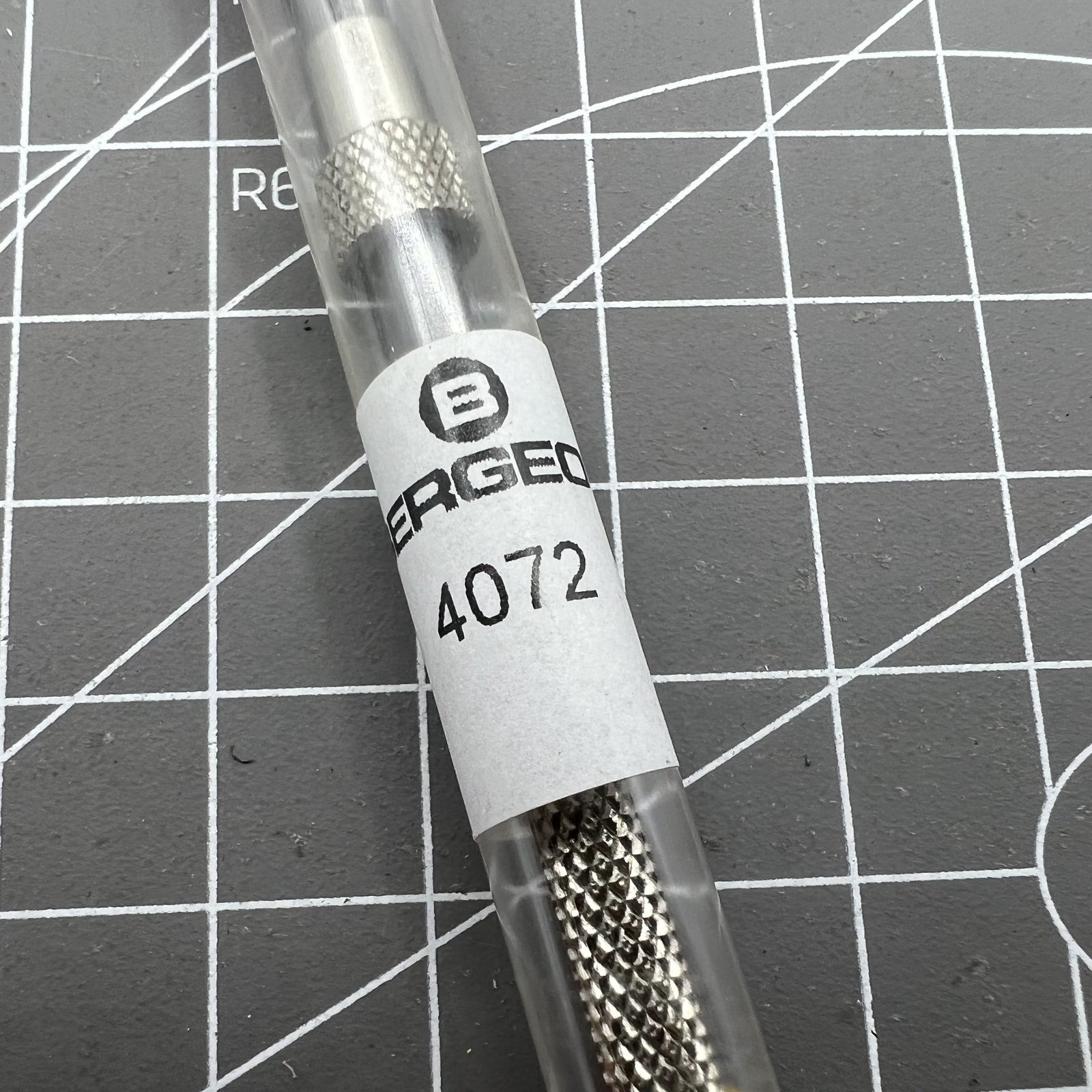 Swiss Bergeon 4072 precision pin vise 105mm for secure hairspring holding in watch repairs.
