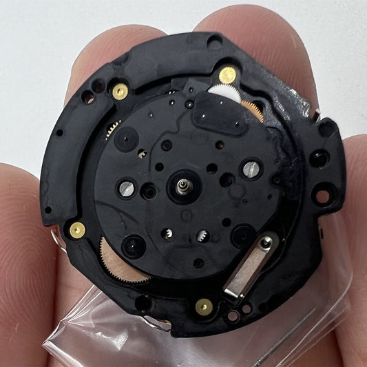 Hattori Epson TMI VD54C quartz watch movement, precision-made in Japan for reliable timekeeping.