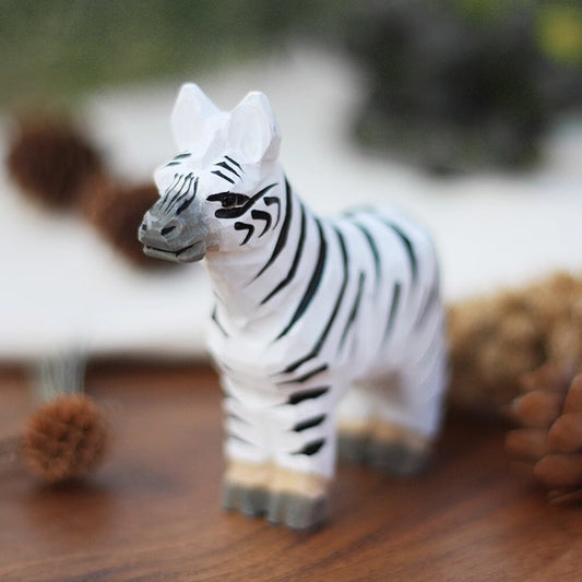 Handmade Little Zebra wooden figurine, detailed decorative sculpture for home or office display.