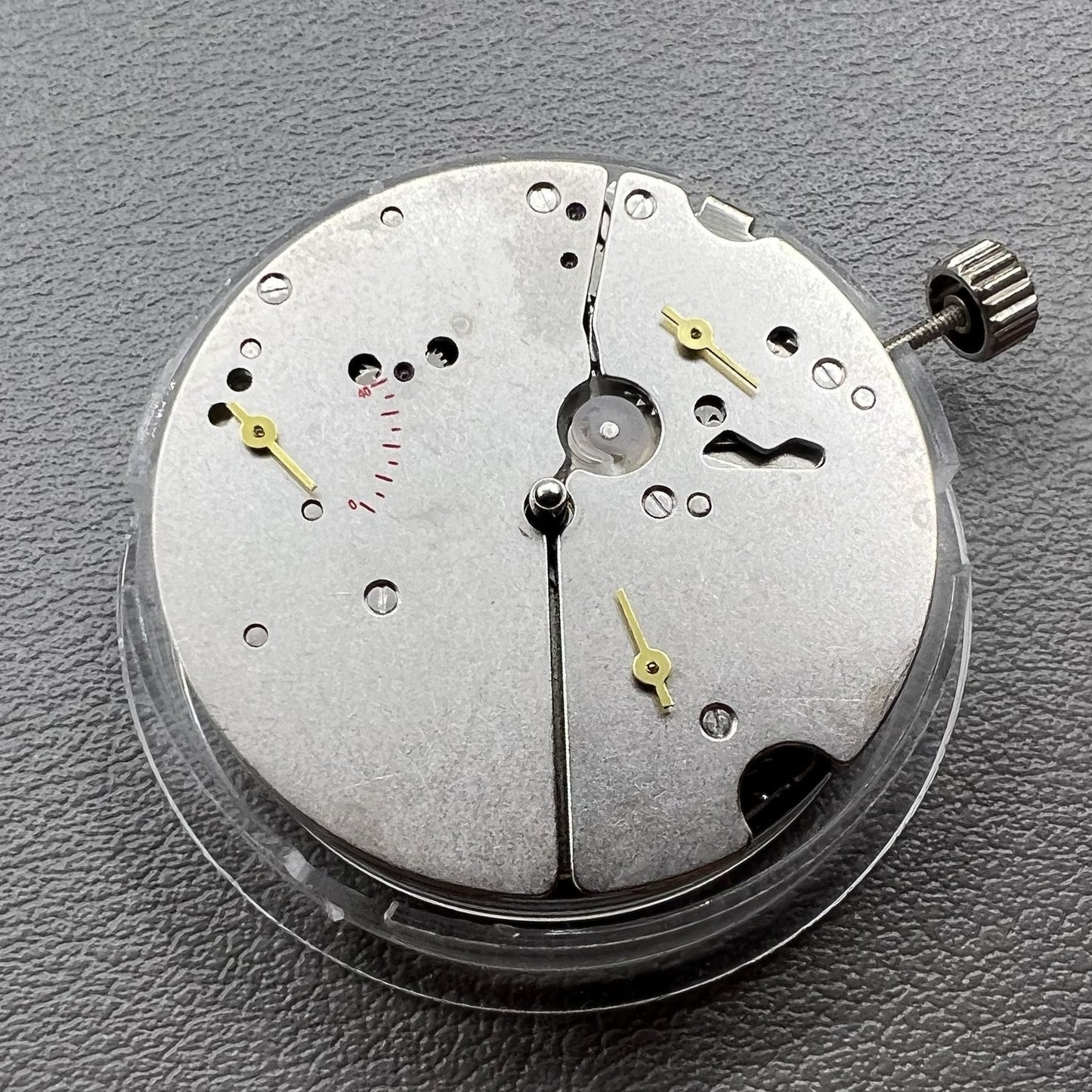 Tianjin T17 ST17 hand-winding watch movement showcasing 2 hands and power reserve at 10 o'clock.