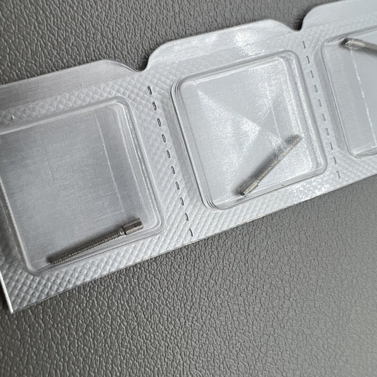 Set of 2 Swiss stainless steel extension stems, 0.9mm to 1.2mm, ideal for watch accessory upgrades.