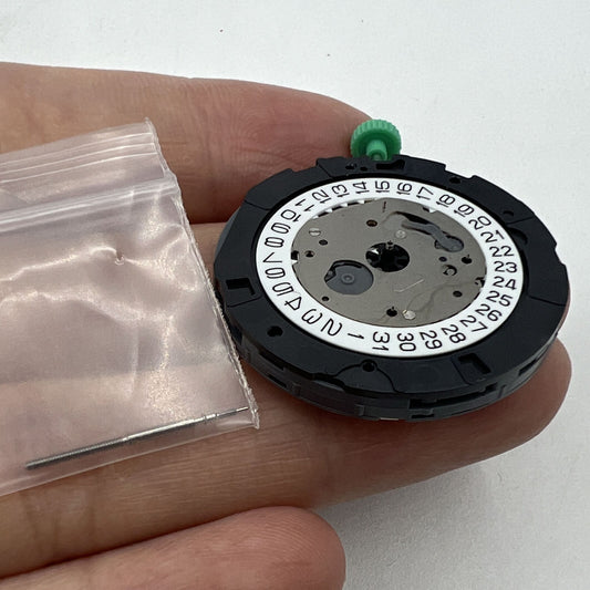 Miyota OS20 quartz watch movement with date at 4:30, precision crafted in Japan for watchmakers.