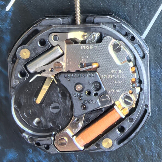 Epson VX36 quartz watch movement with 5 hands, Japanese-made for precise timekeeping accessories.
