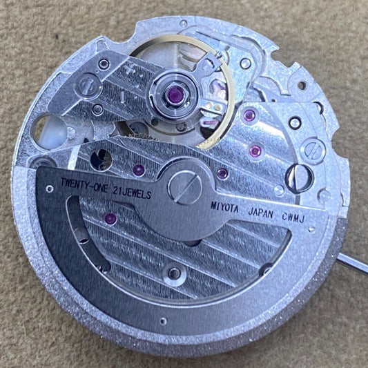 Japan Made Miyota 8217 movement watch part with 3 hands and small second at 9 for precise timekeeping.