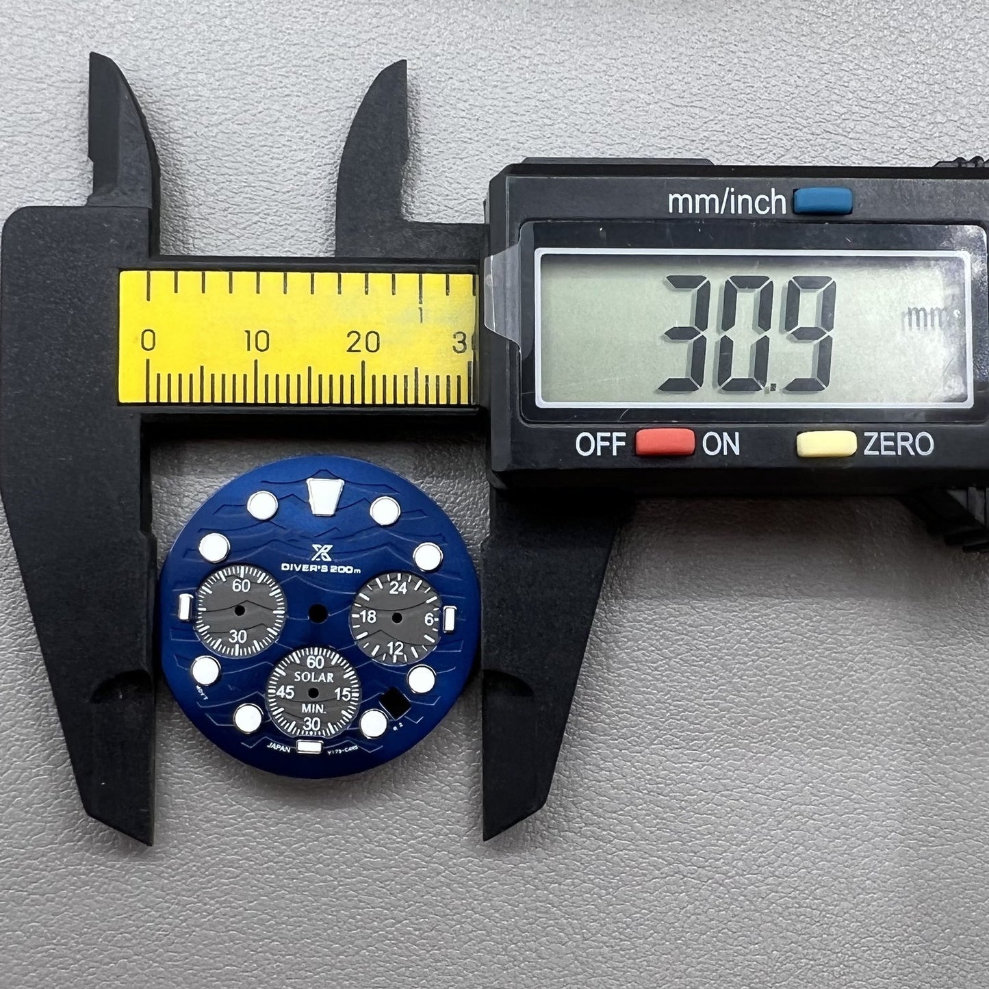 Green luminous watch dial with 31mm silver trim, designed for VD53 movement and repairs.