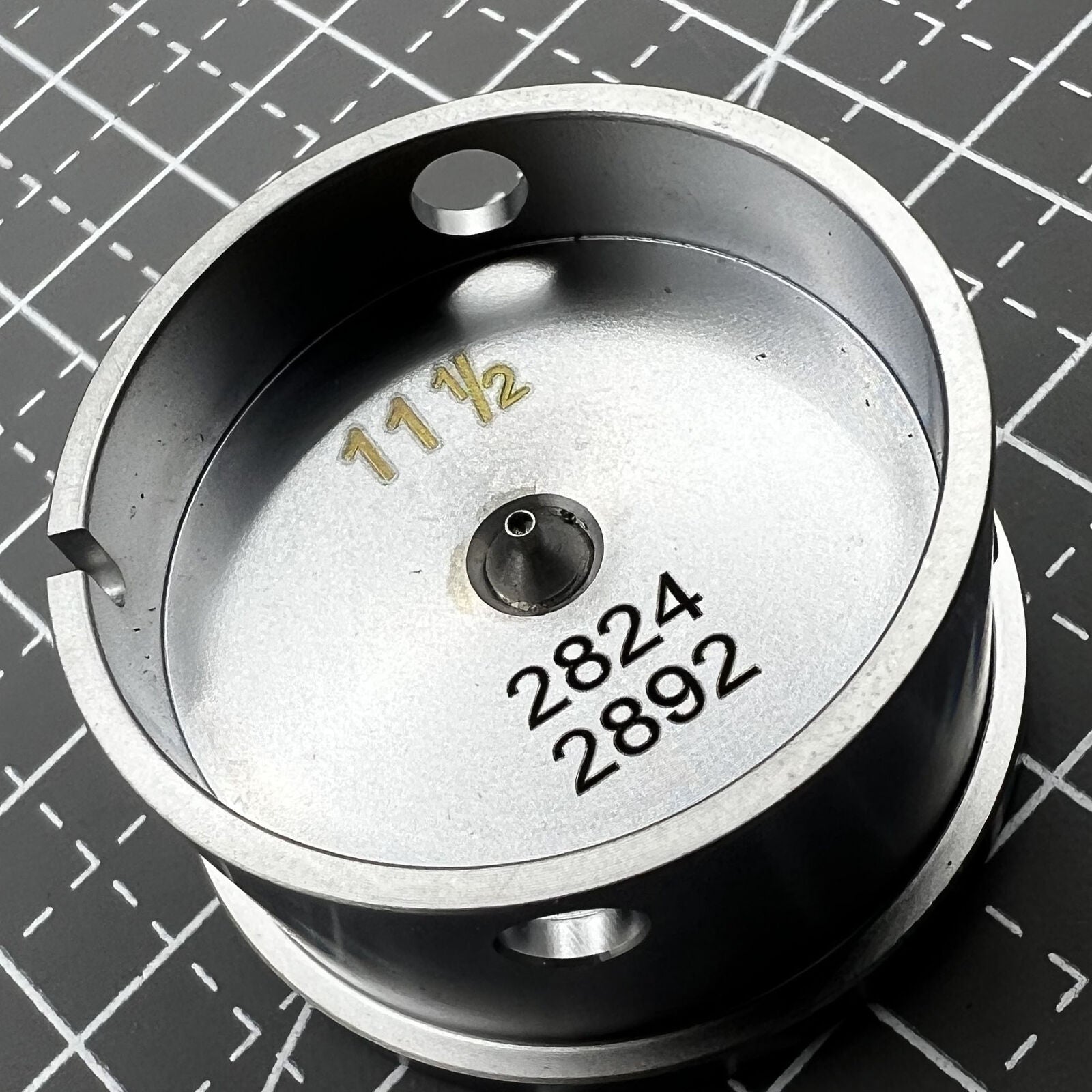 Watch movement holder for ETA 2892/2824, secure center screw for precise watch repair.