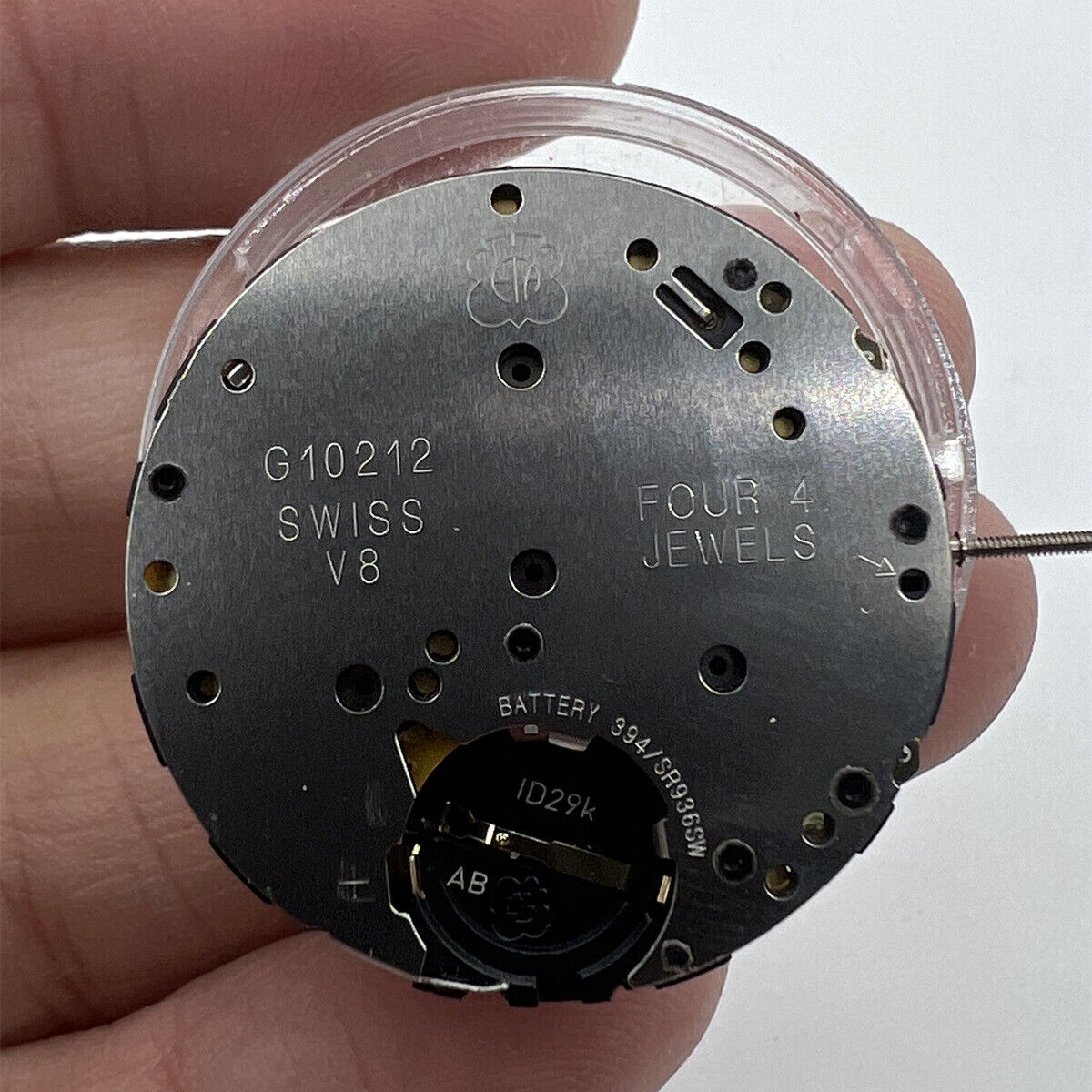 ETA G10.212 quartz watch movement with 3 hands and date feature for precise timekeeping.