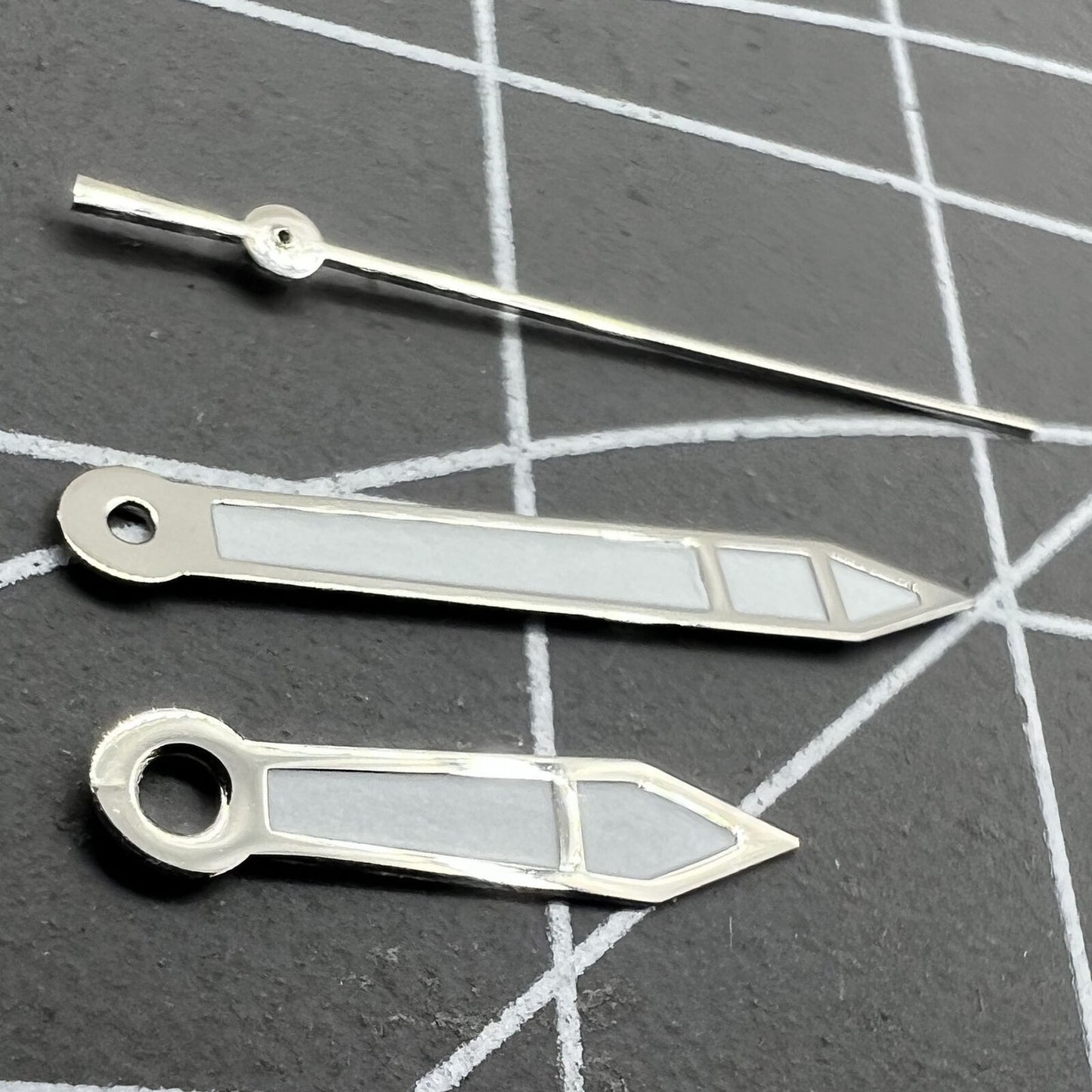 Silver 15.7mm watch hands with white paint and silver trim for Miyota 2315, 2035, 2036, 2115, 2305 movements.
