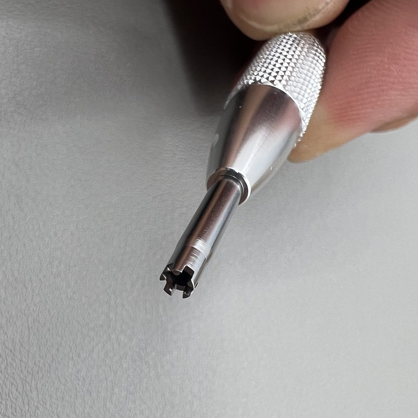 Prong spokes watch screwdriver designed for precise Richard Mille screw removal and case adjustments.