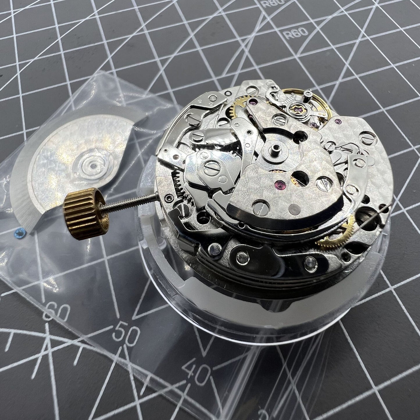 Automatic chronograph watch with ETA 7753 movement and small seconds at 6 o?clock, sleek design.