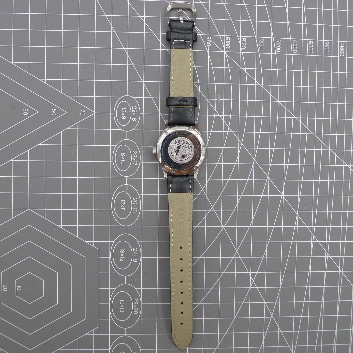 Beijing 31mm manual mechanical watch with silver case, double rhomb dial, showcasing classic Chinese craftsmanship.