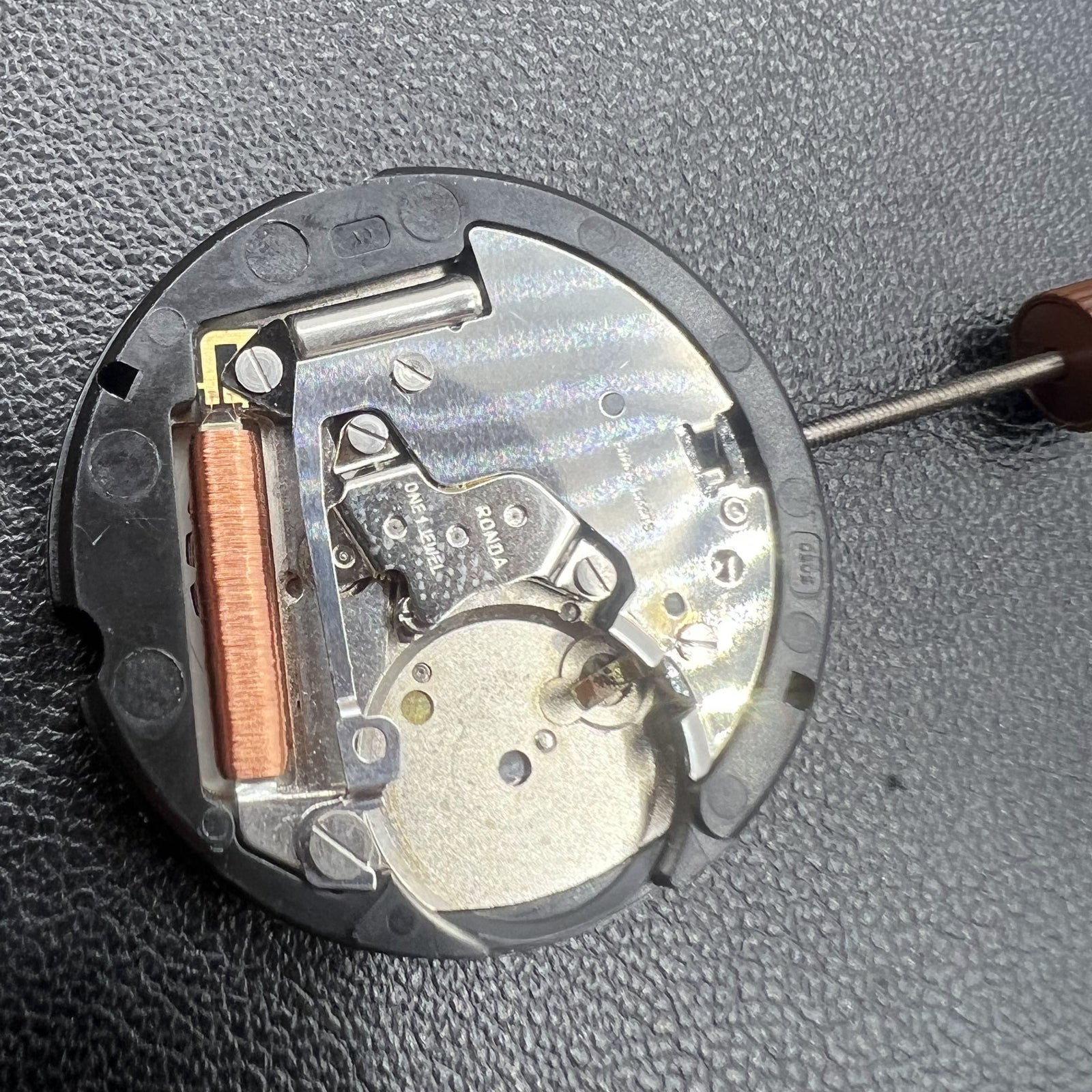 Ronda 505 24D quartz watch movement with date window at 3 o'clock, accurate timekeeping by Ronda.