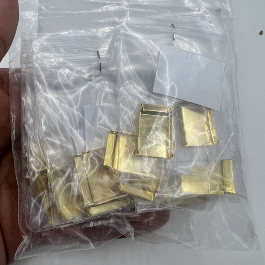 Set of 14 gold watch strap extenders with bracelet clasps for comfortable sizing adjustments.