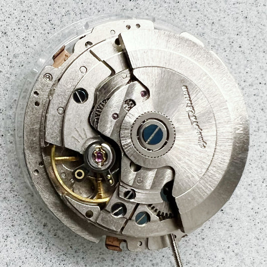Close-up of China Hangzhou 2824 Big Date automatic mechanical movement for watch accessories.