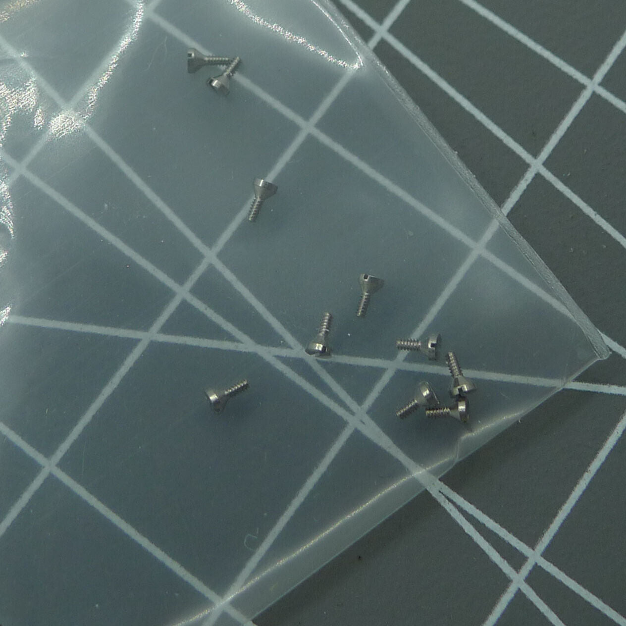 Watch case cushion mount screws for Miyota 8215 8200 movement, durable replacement parts.