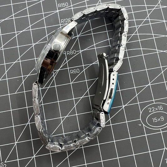 Silver 32mm Shanghai Factory manual mechanical watch with 19 jewels, shock-resistant, classic style.