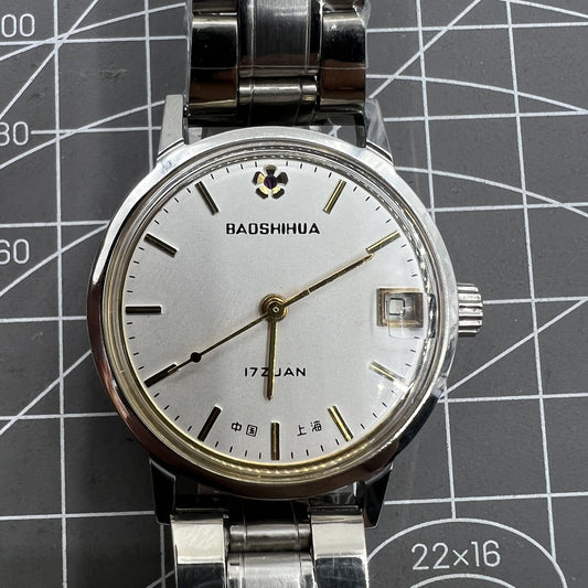 33mm Shanghai manual mechanical watch with single calendar, 17 jewels, shock-resistant design by Shanghai.