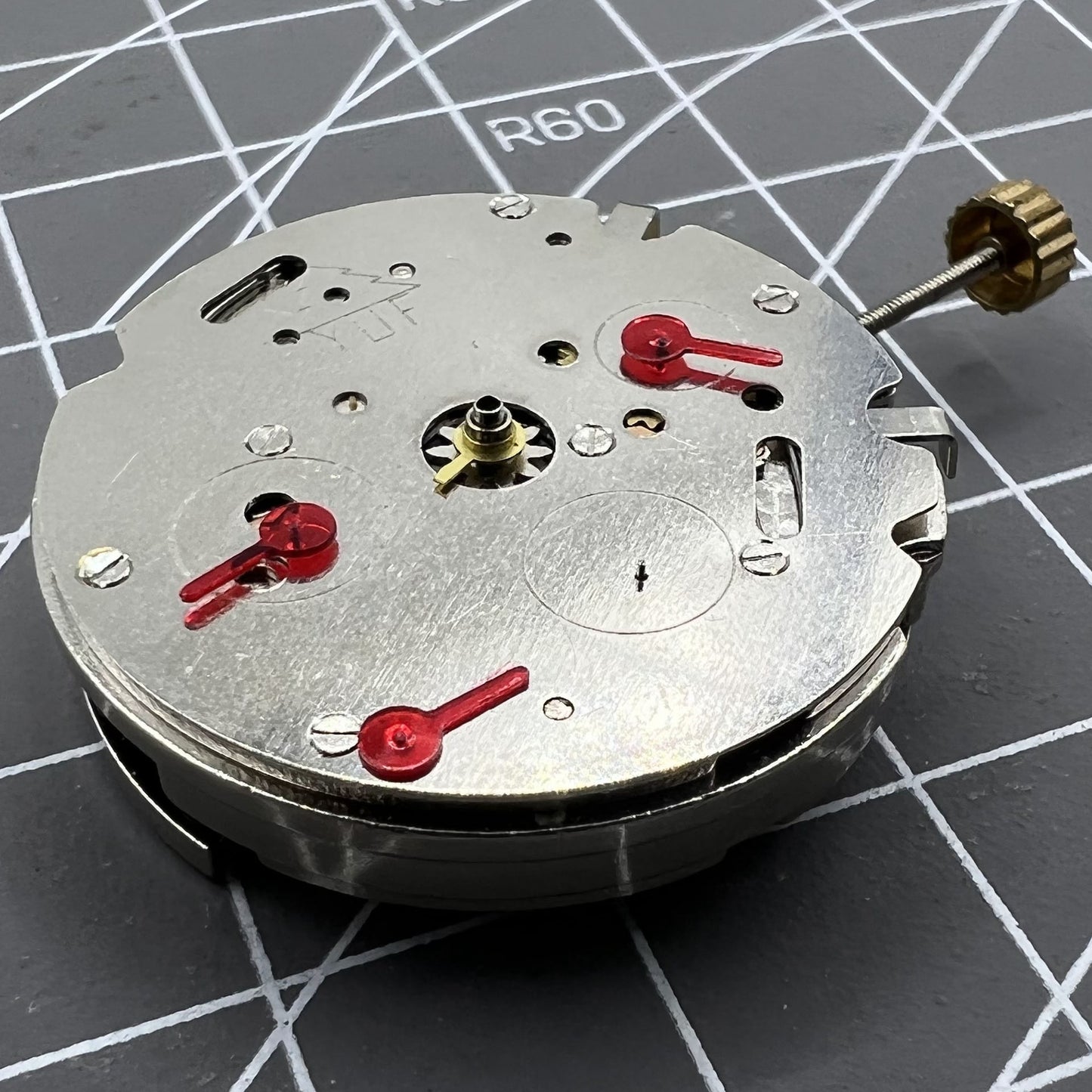 26.5mm Dandong 7120 automatic watch movement with multi-function features for precise repair.
