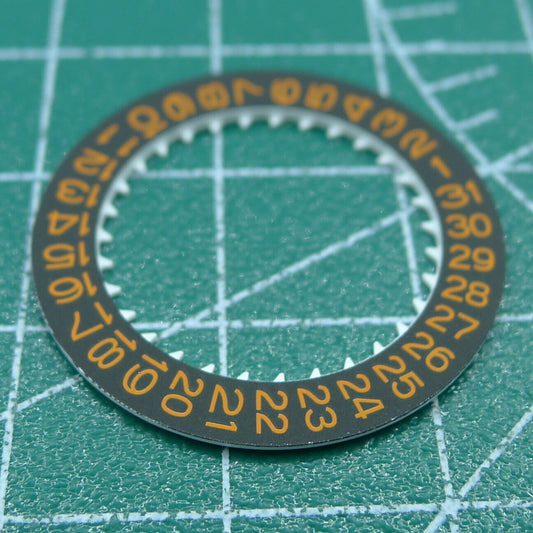 Orange font date disk for NH35 watch movement with black background, ideal for watch repairs.